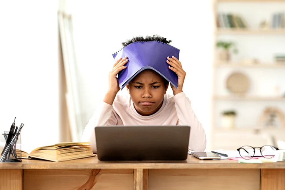 Elementary+school+girl+frustrated+at+ineffective+digital+learning+strategies